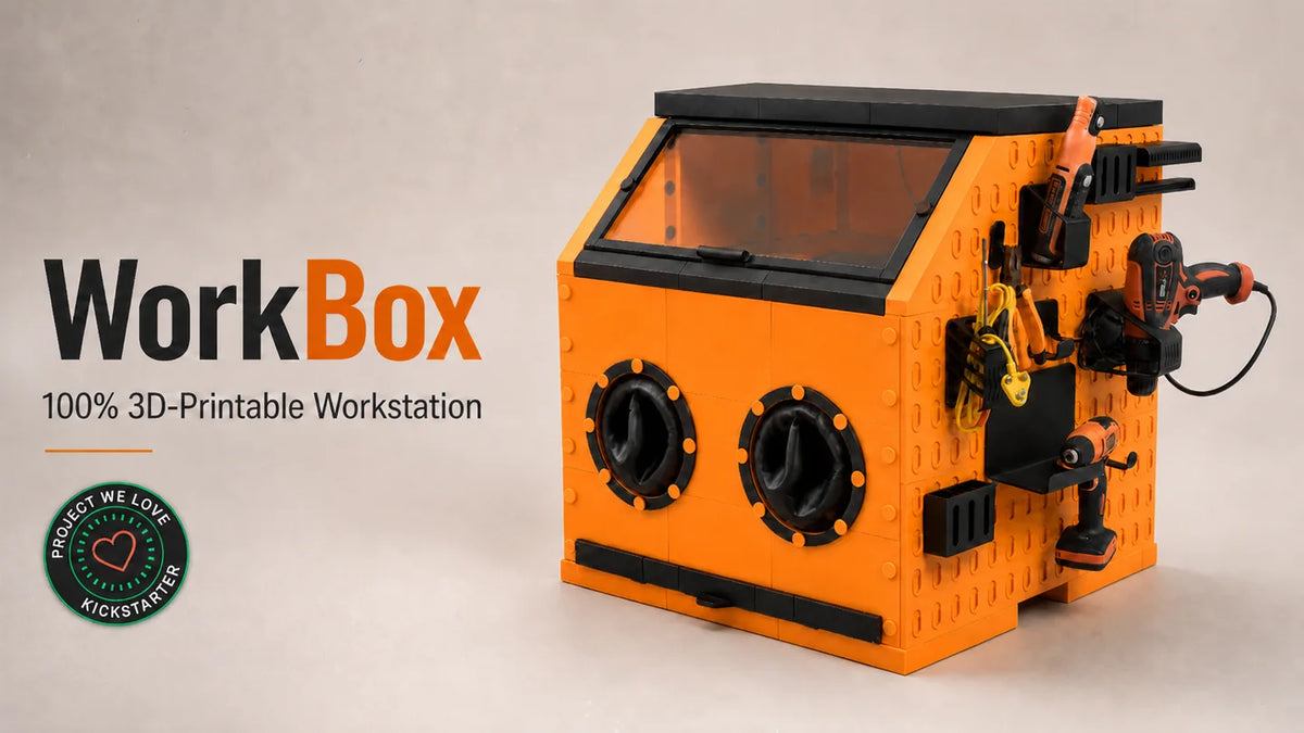WorkBox orange and black 3D-printable enclosed workstation with clear front, hand ports and tool holders